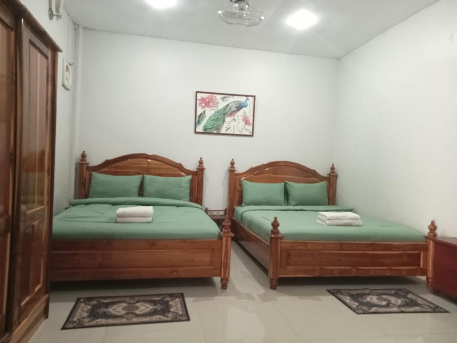 Erawan Guesthouse Паксе Екстер'єр фото