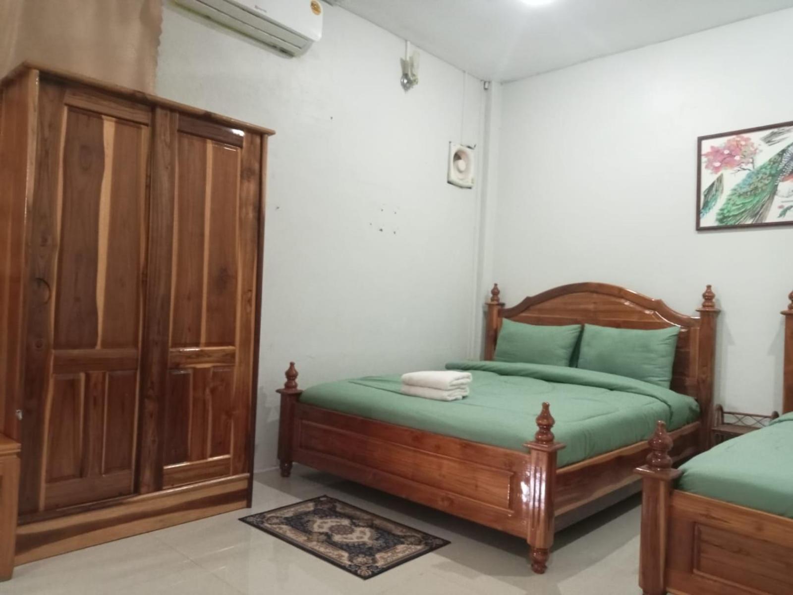 Erawan Guesthouse Паксе Екстер'єр фото
